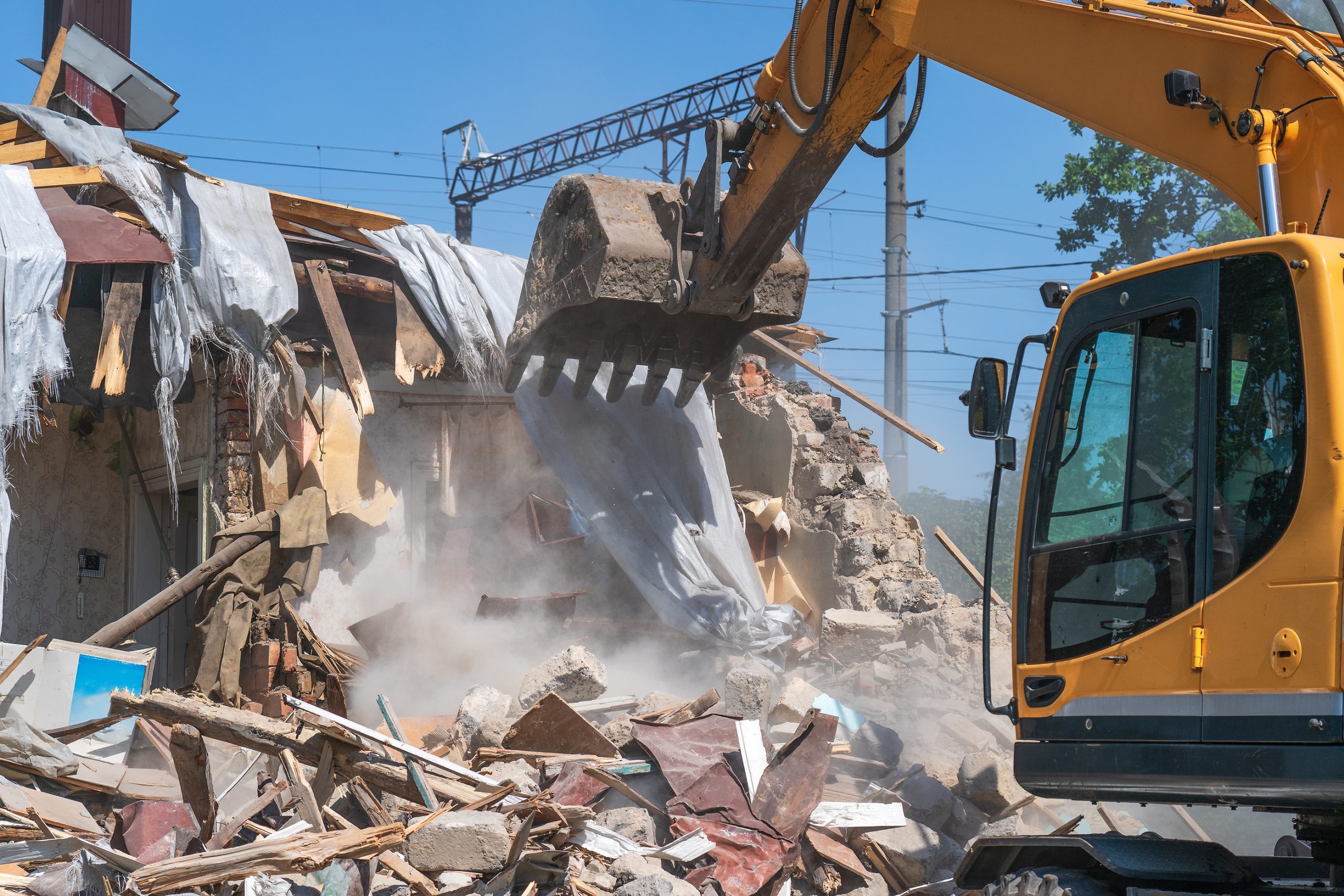 bigstock-Process-Of-Demolition-Of-Old-B-425781413-scaled